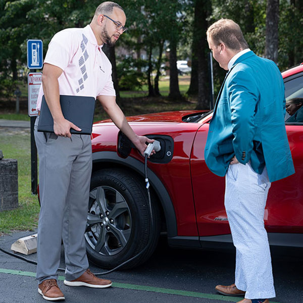 Man charging EV