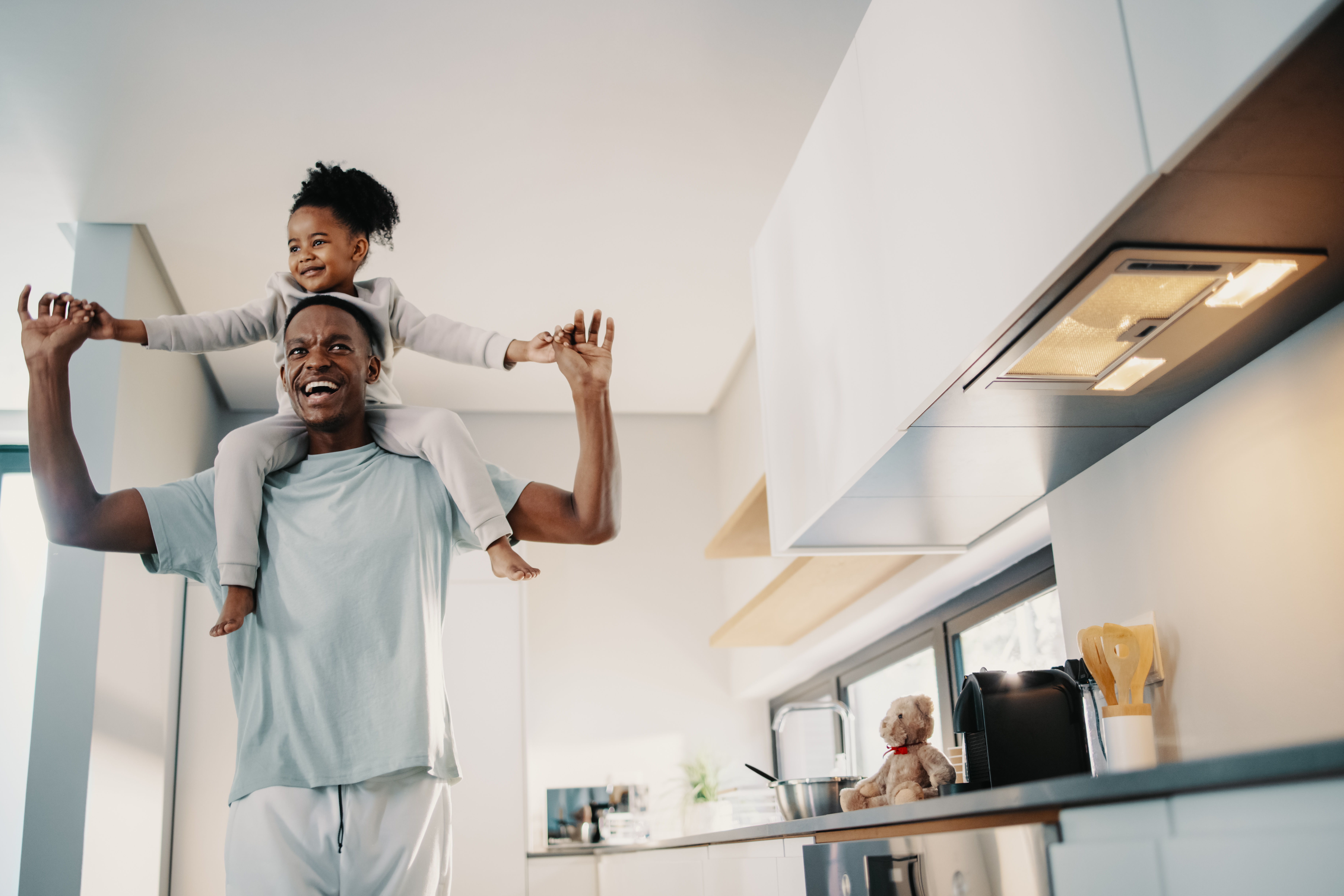 Man with girl on shoulders
